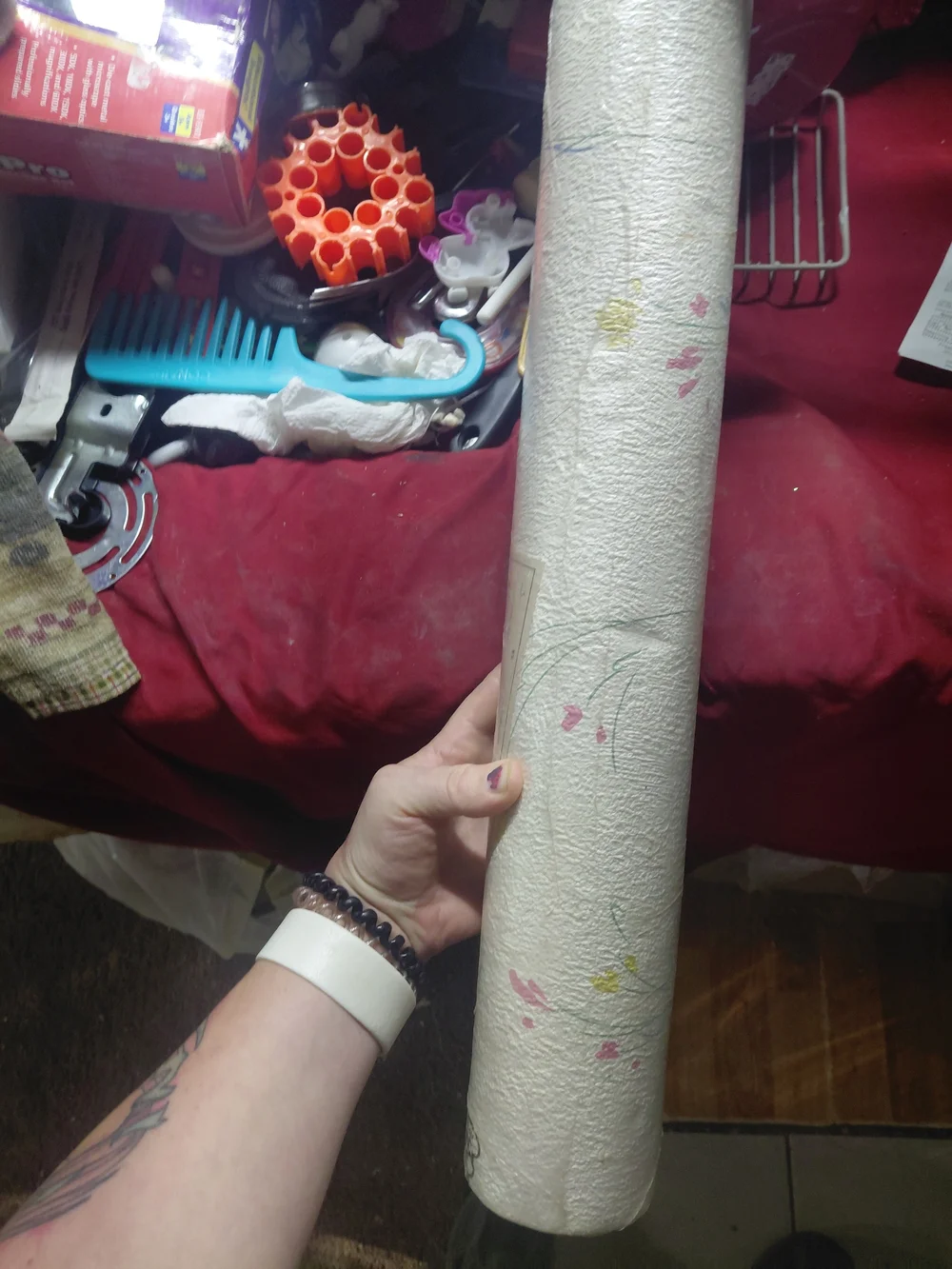 double roll of pre-pasted, strippable wallpaper, specifically identified as the
